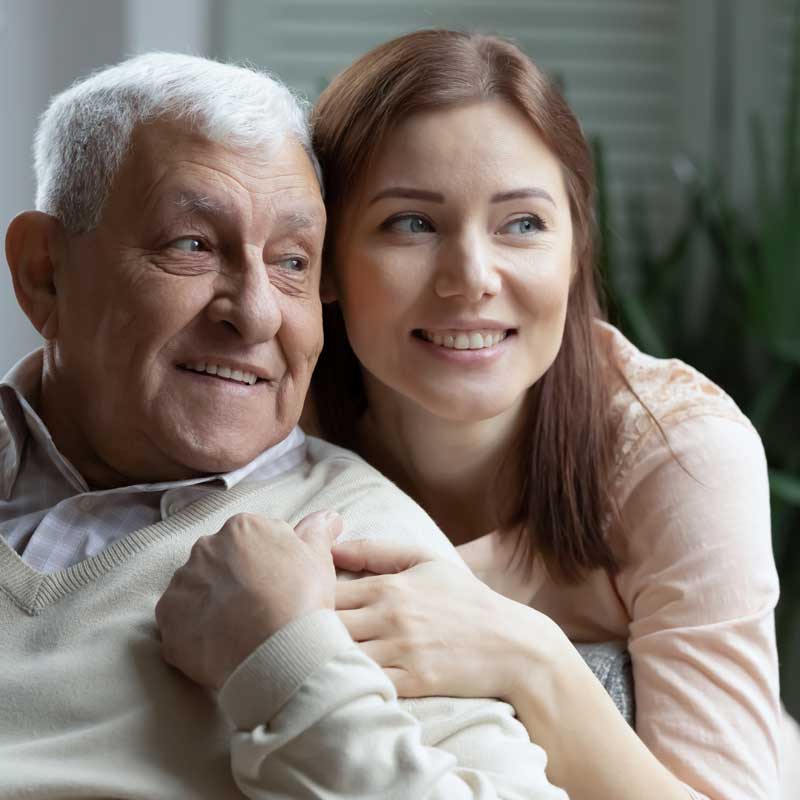Long Term Care attorney massachusetts: photo of senior father and adult daughter