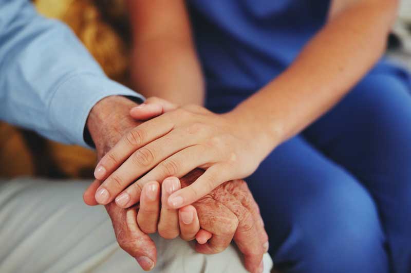 how to get power of attorney - Photo description: People, holding hands and help for healthcare with love, care and trust.